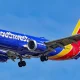 Southwest Airlines checked baggage fees end free bags policy 2025