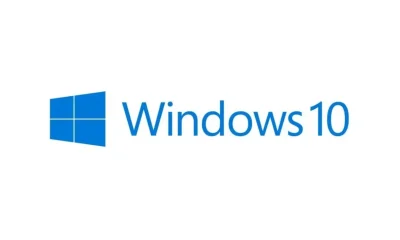 Frustrated user looking at a Windows 10 PC displaying a BitLocker recovery screen, illustrating Windows 10 update problems from KB5058379.
